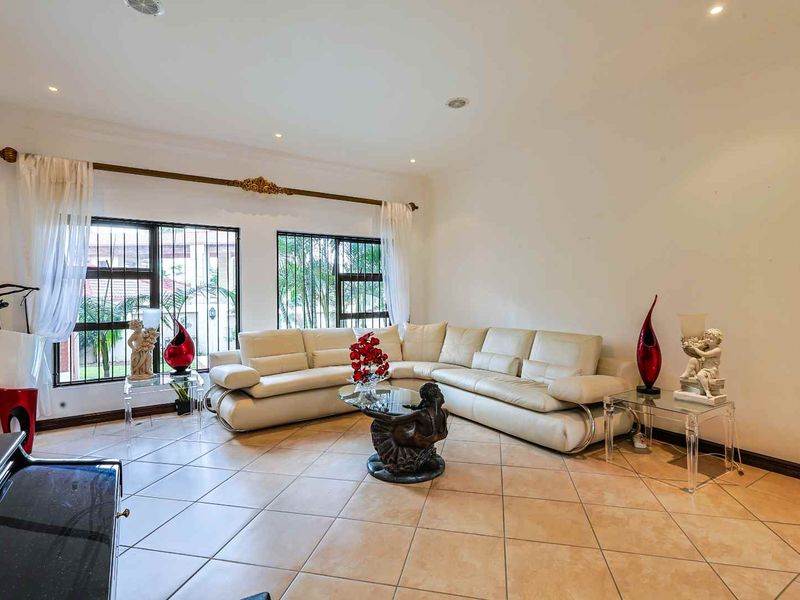 This spacious fully furnished 4-bedroom, 3.5-bathroom home offers comfortable family living with generous entertainment areas and modern conveniences. - Photo 6