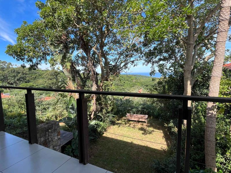 Charming 3-Bedroom Duplex in Zimbali with  Distant Sea Views - Photo 7