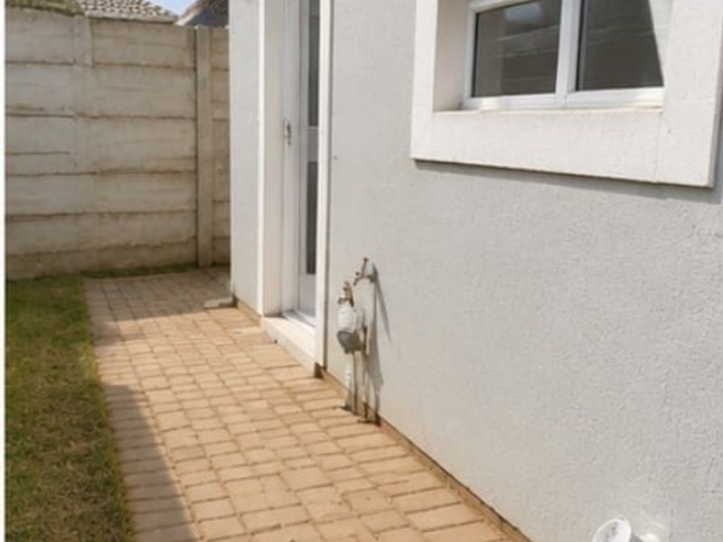 Safe & Spacious 3-Bedroom Home with Yard – Move-In Ready in "GREENWOOD GARDENS" Estate Alliance - Photo 7