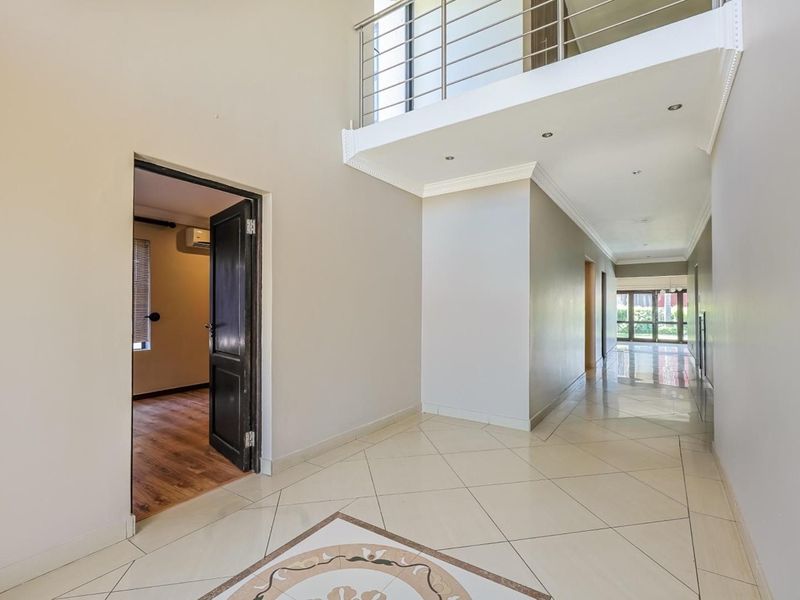 This grand 5-bedroom, 4.5-bathroom home redefines spacious, luxurious living. - Photo 4