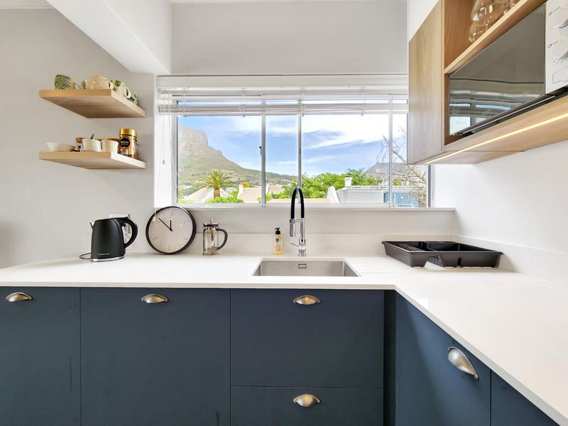 Top-Floor Gem in Upper Gardens with Stunning Table Mountain Views - Photo 8