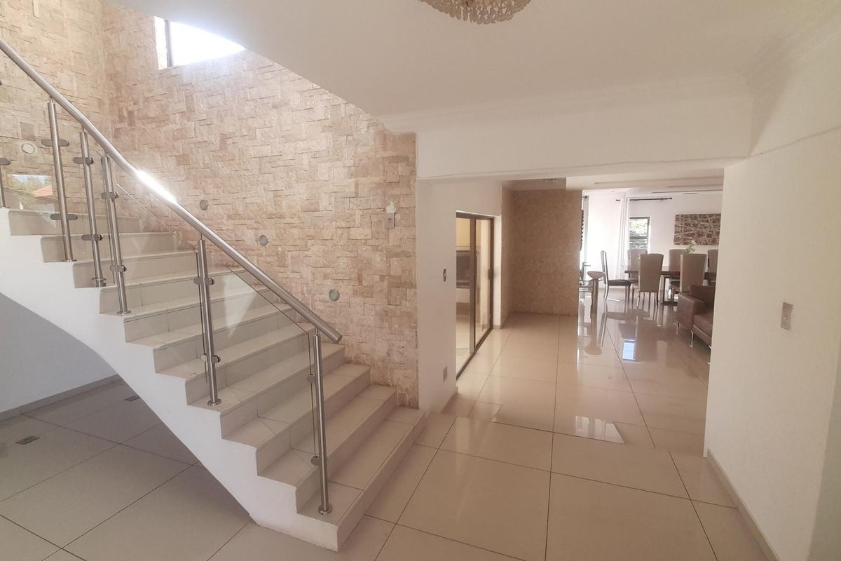 Elevate Your Lifestyle: Luxurious 4-Bed, 4-Bath Estate Living - Photo 3