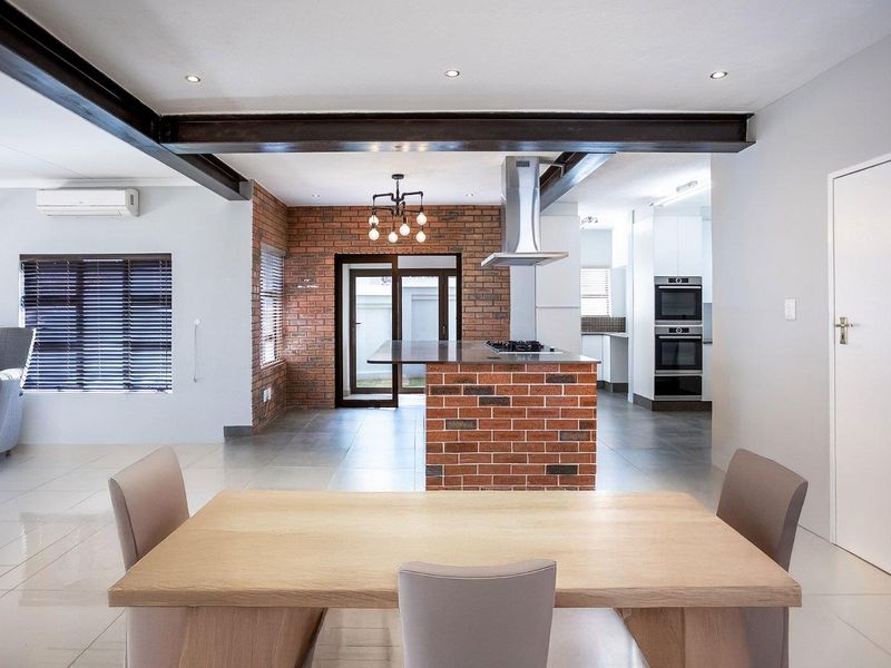 Luxury Modern Renovation in Sought-After Security Estate - Photo 4