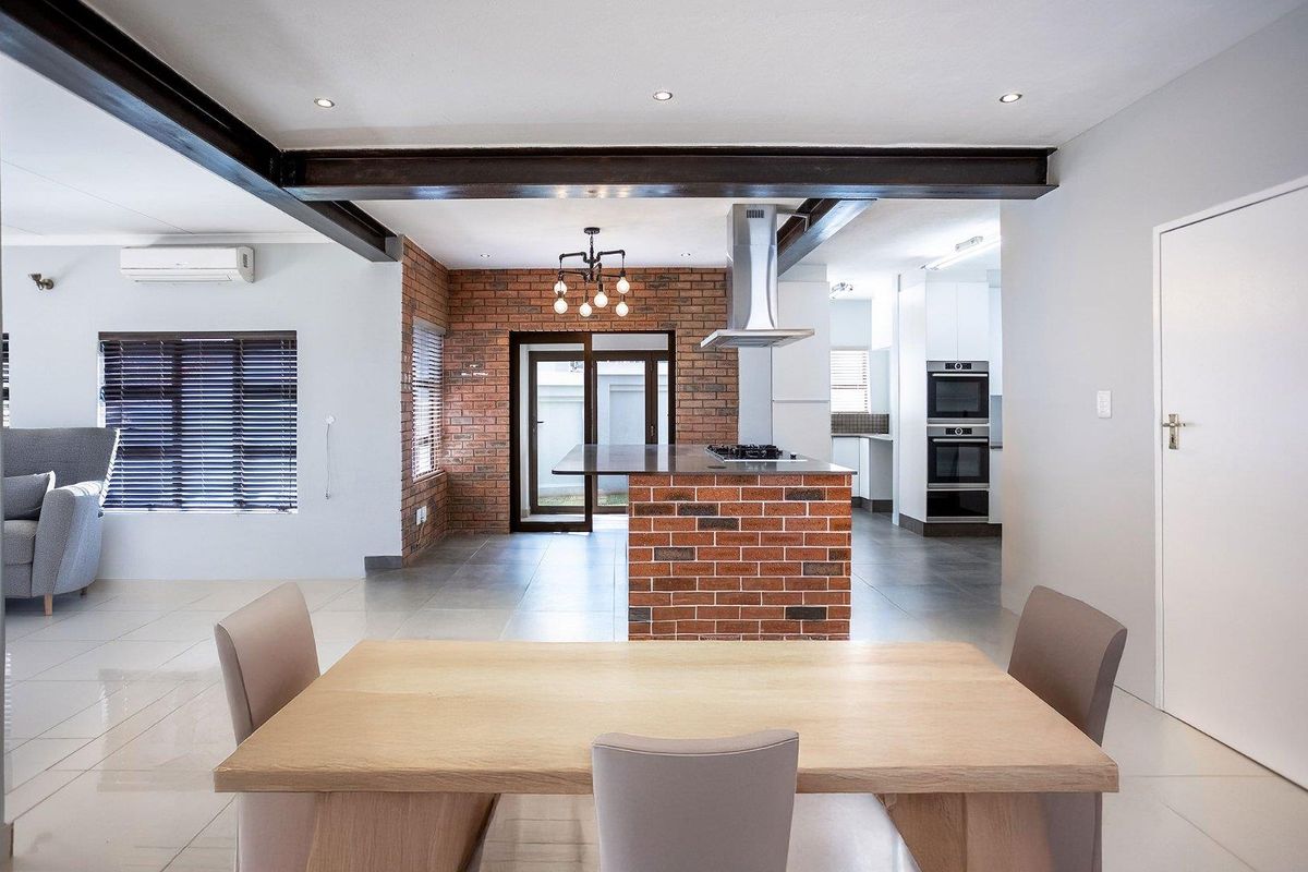 Luxury Modern Renovation in Sought-After Security Estate - Photo 4