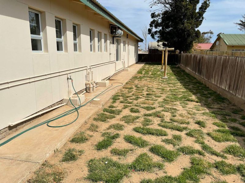 Turnkey Opportunity: Six En-Suite Bachelor Flats with Braai & Communal Area's - Photo 3