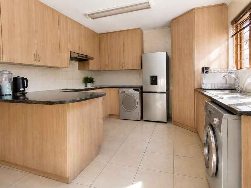 Elegant Townhouse with En-Suite and Covered Patio - Photo 3
