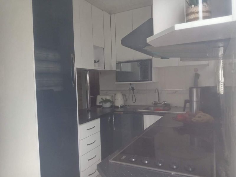 THREE BEDROOM HOUSE TO RENT IN WINDMILL PARK EXT 12 - Photo 4