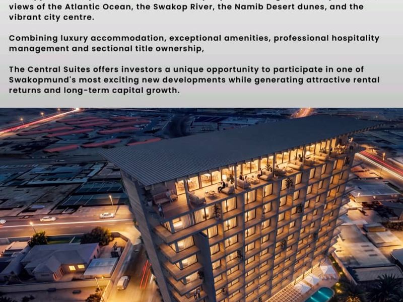 Aerial perspective of The Central Suites, a modern high-rise development featuring a rooftop terrace, swimming pool, and balconies in Swakopmund.