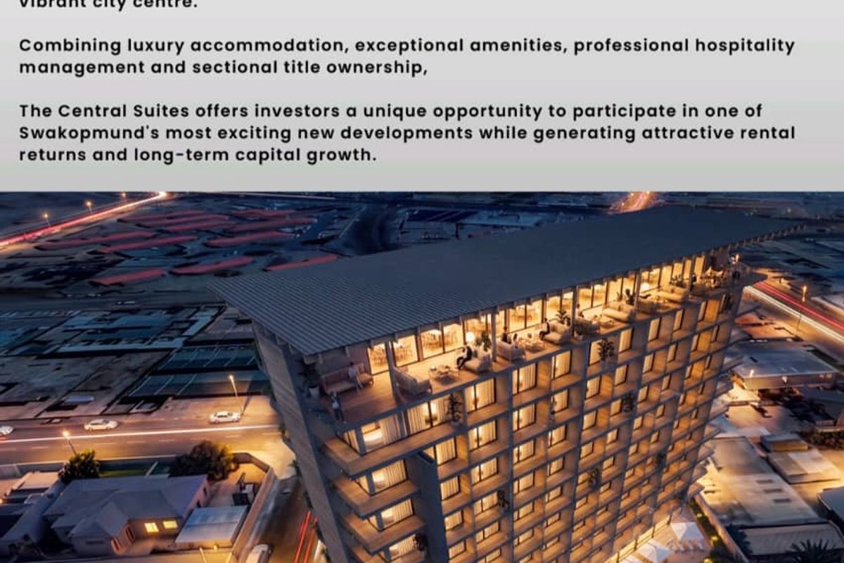 Aerial perspective of The Central Suites, a modern high-rise development featuring a rooftop terrace, swimming pool, and balconies in Swakopmund.