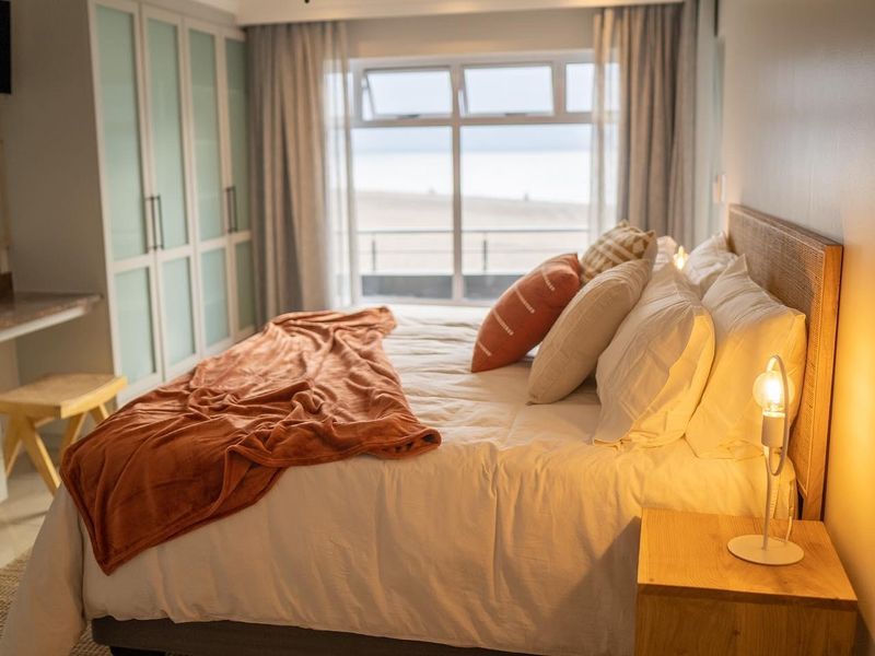 Beachfront Investment Opportunity – Fully Furnished & Airbnb-Ready - Photo 2