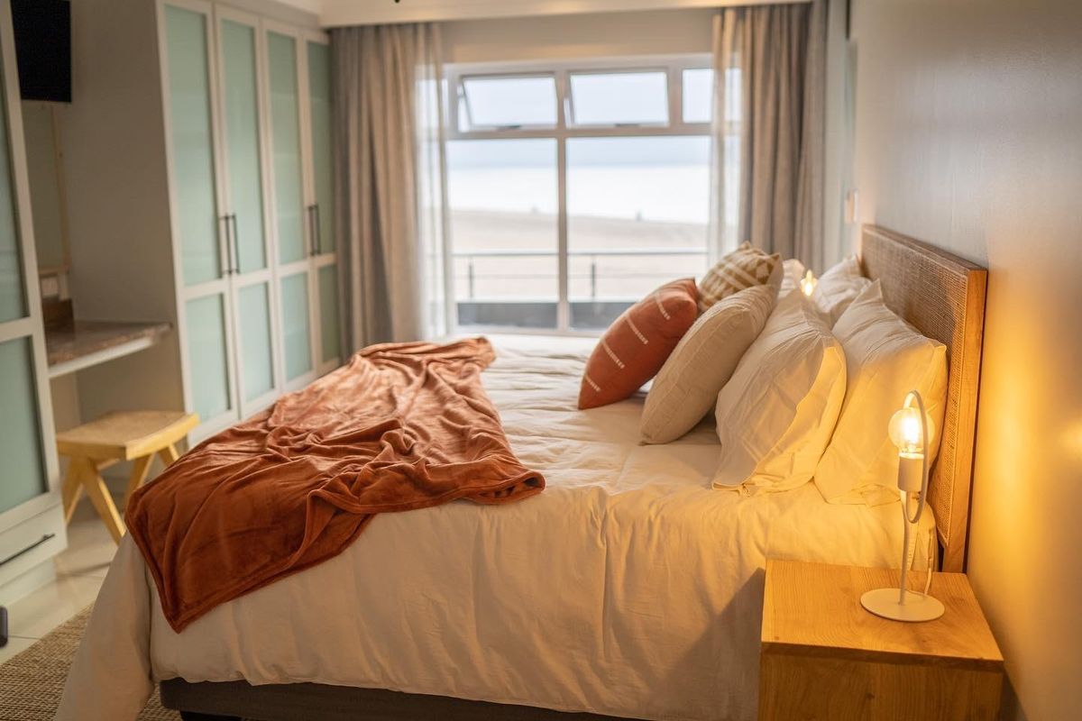 Beachfront Investment Opportunity – Fully Furnished & Airbnb-Ready - Photo 2