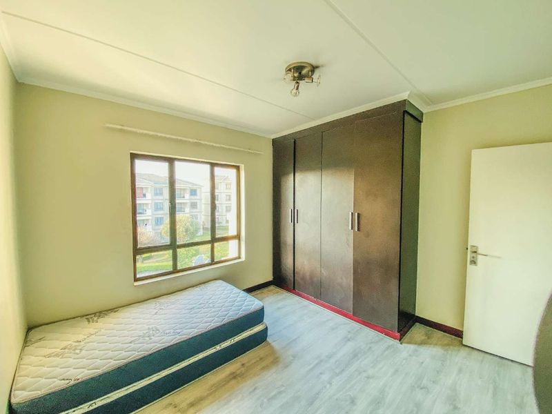 Spacious 2-Bedroom Home with Covered Parking in Secure Estate - Photo 10