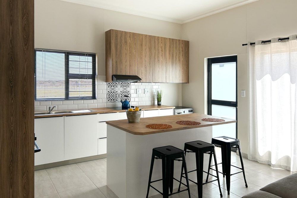 Modern kitchen with sleek kitchen island.