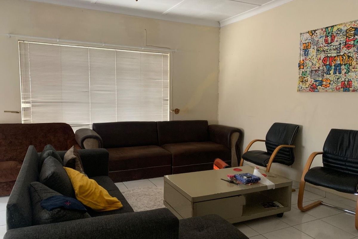 **Charming 3-Bedroom Home with Income Potential in a Tranquil Neighborhood** - Photo 3