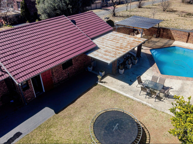 Entertain in Style: Covered Braai with a Pool in This Stunning Home - Photo 3