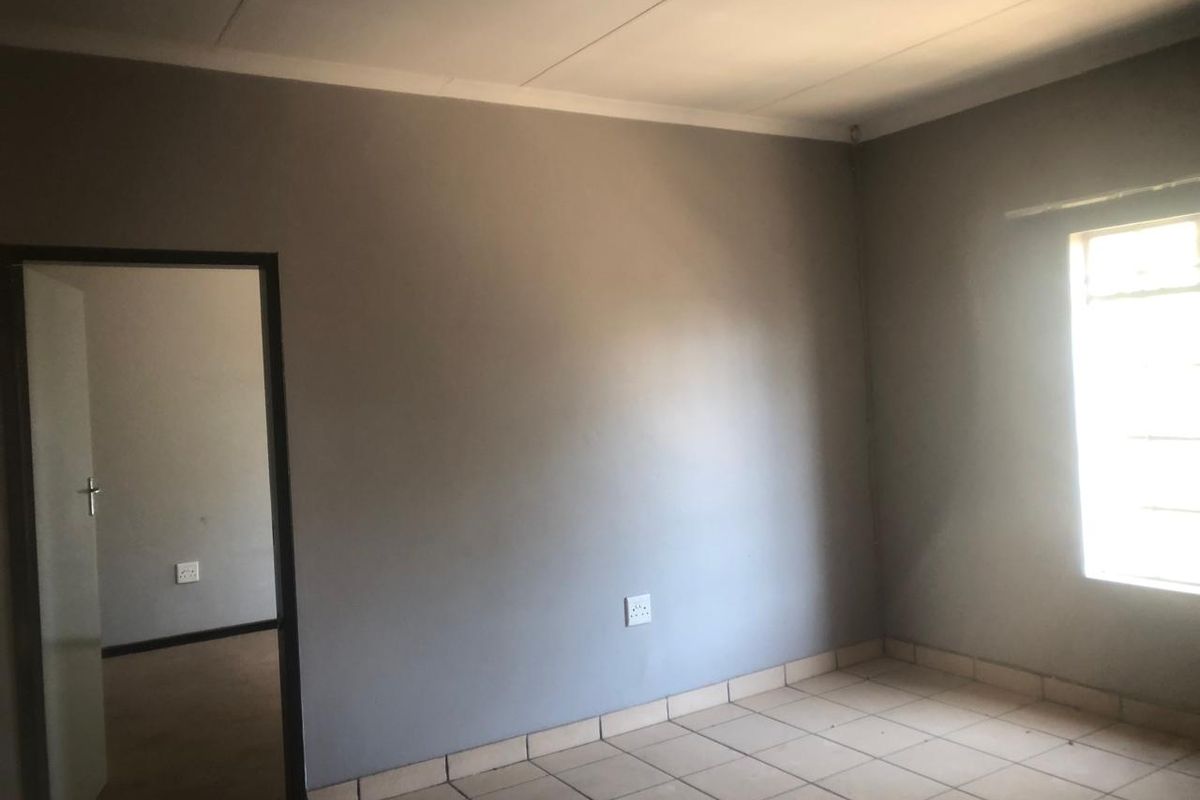 1-Bedroom Bargain: Prime Location & Covered Parking!" - Photo 5