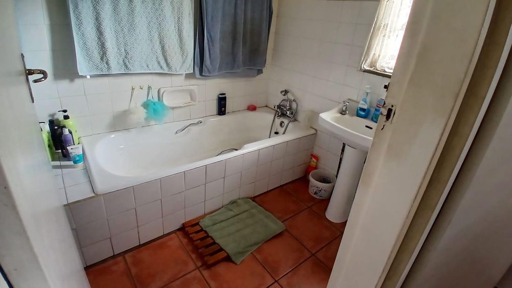 Bathroom with bath and hand basin