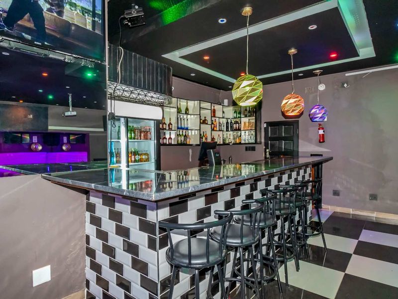 Prime Business-Zoned Property with High Visibility & Multiple Income Potential - Photo 9