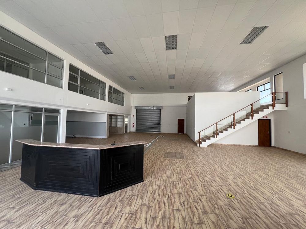 Main entrance reception area, offices and upstairs entertainment area