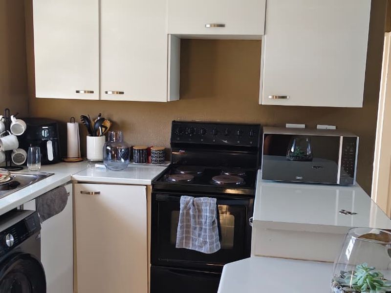 Modern Living Awaits in Serene Suburb! - Photo 2