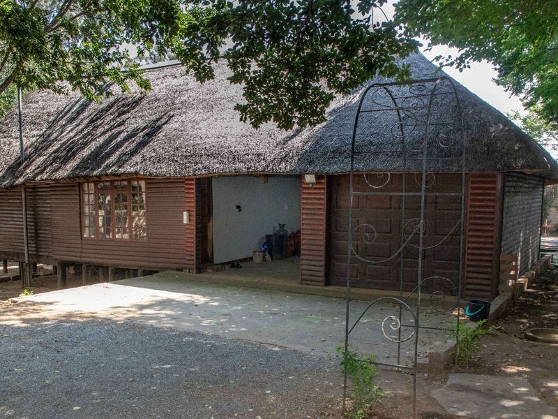 Charming Turnkey Investment – Character-Filled Thatch Roof Home - Photo 6