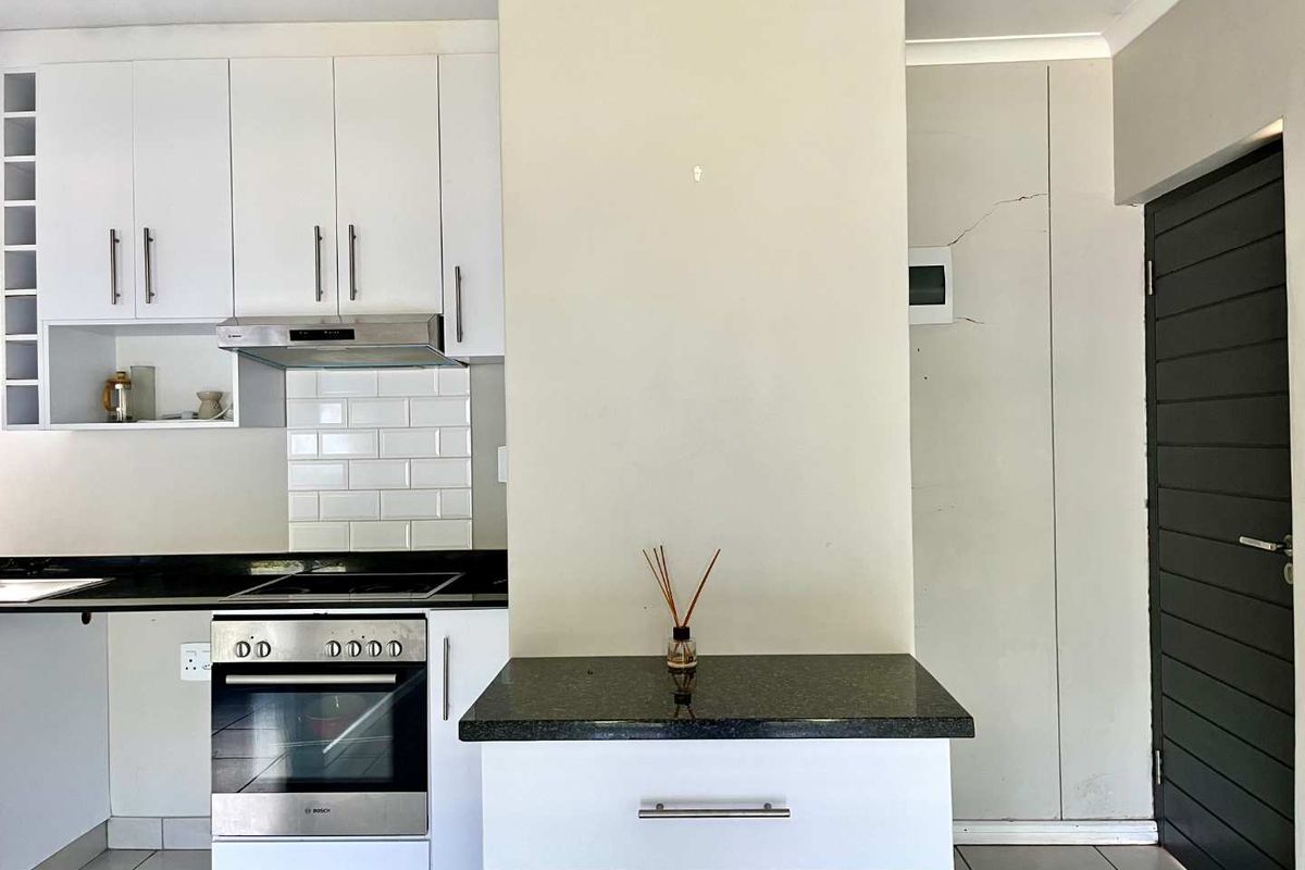 Stylish 1-Bed Garden Apartment in Sought-After The Woods Estate - Photo 3