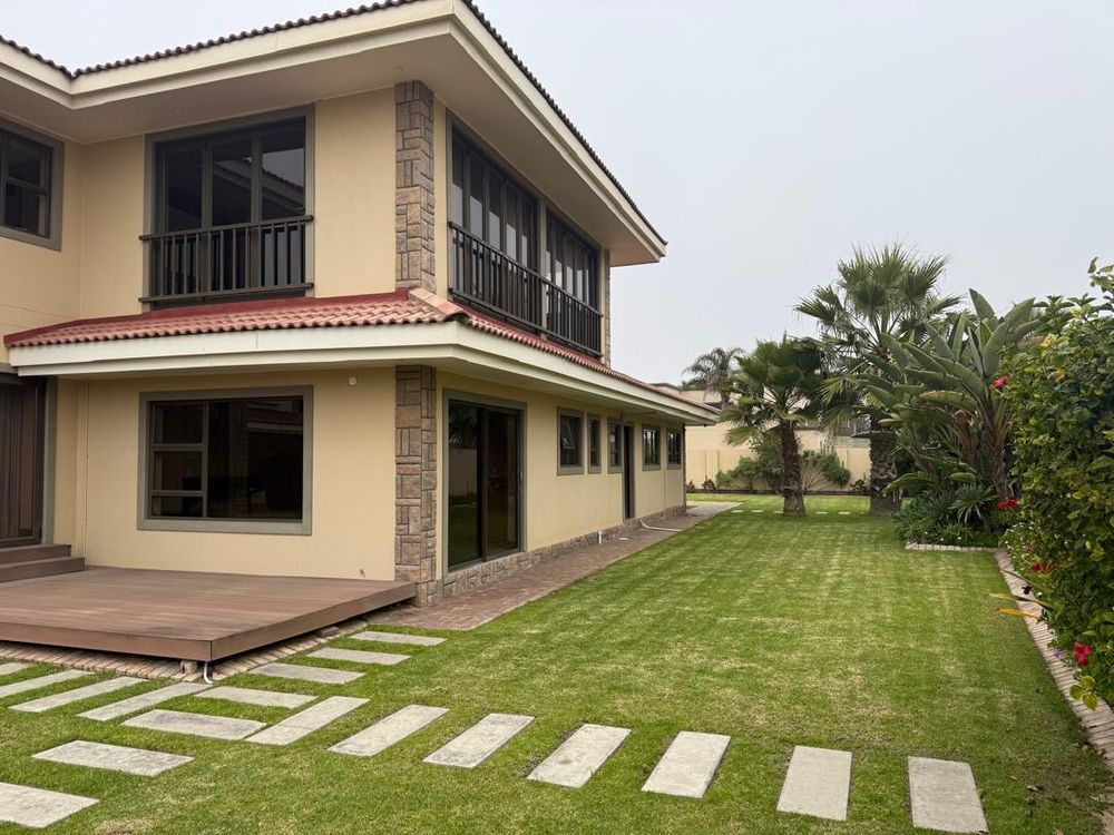 Side of the house and garden