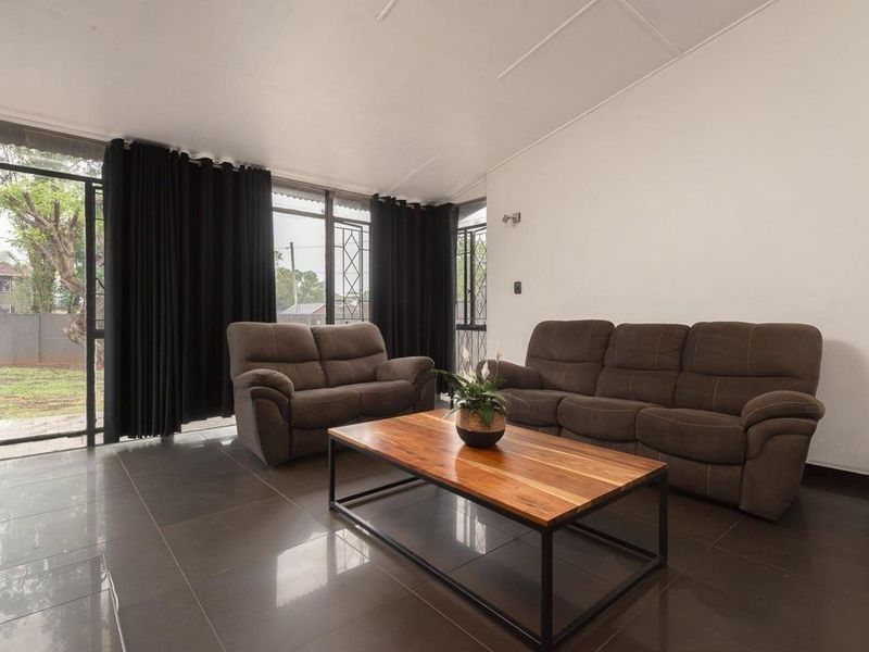 Secure Family Living with Pool and Spacious Garaging - Photo 9