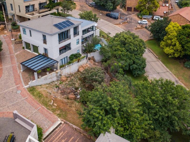 Nestled in a sought-after estate in Pretoria East, this exceptional 431 sqm parcel of land offers a rare opportunity to build your dream home in a setting of timeless beauty. With sweeping, breathtaking views, this is the closest you’ll come to the e - Photo 2