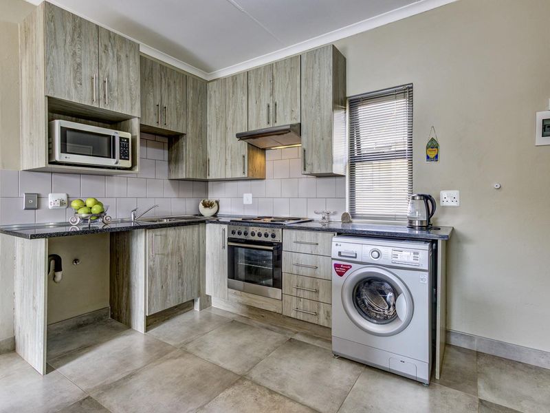 SUNNY, SECURE AND SPOTLESS UPSTAIRS UNIT - Photo 6