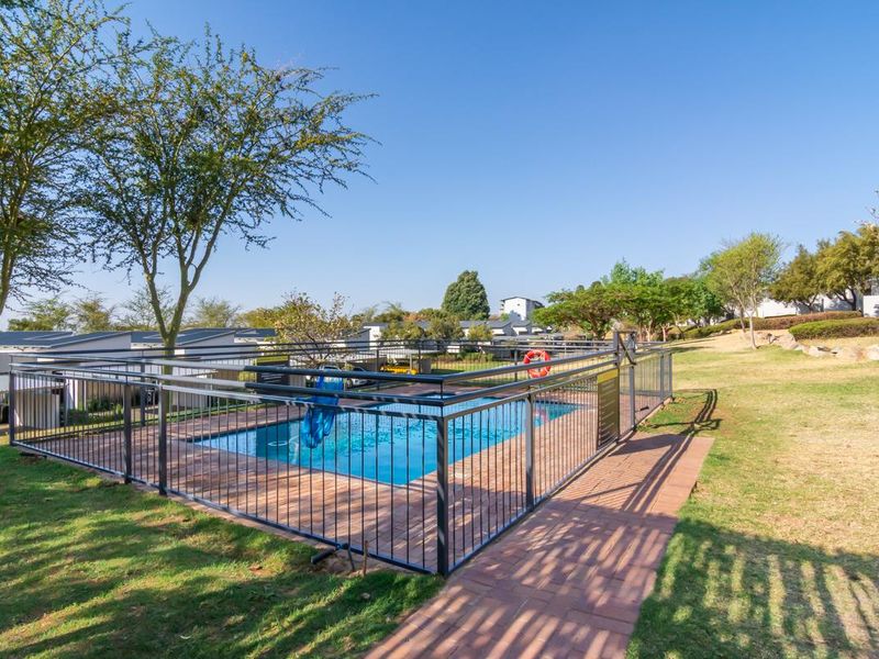 Live the high life in exclusive townhouse in prestigious Golf Estate!" - Photo 2
