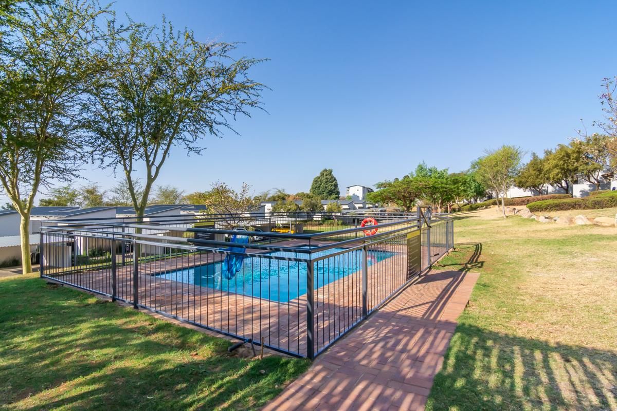 Live the high life in exclusive townhouse in prestigious Golf Estate!" - Photo 2