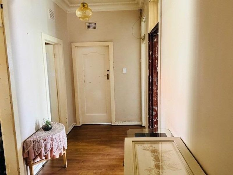 High-Yield Living: A Solid Forest Hill Home With Dual Income Streams - Photo 2