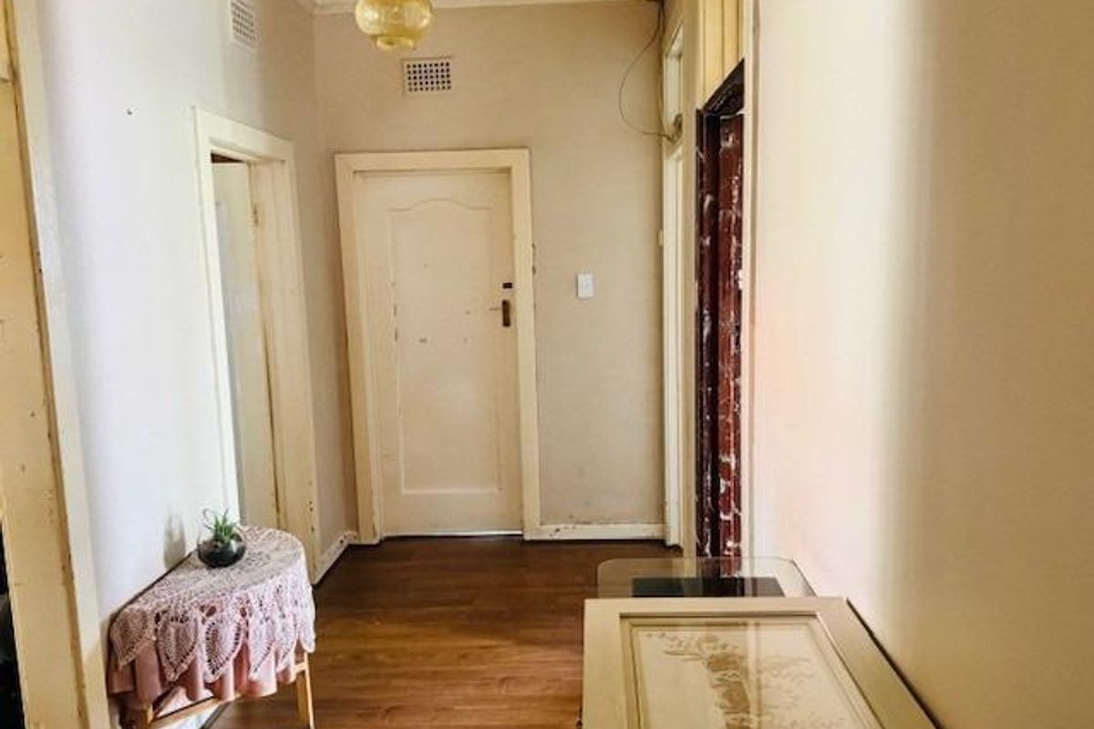 High-Yield Living: A Solid Forest Hill Home With Dual Income Streams - Photo 2