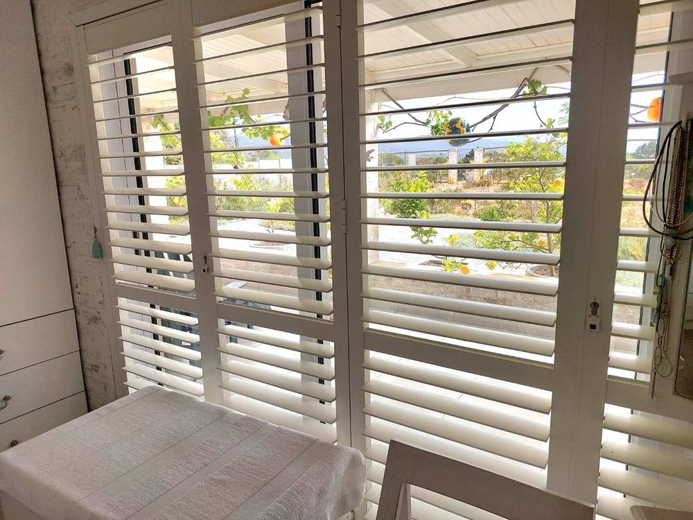 American shutters on all windows and doors