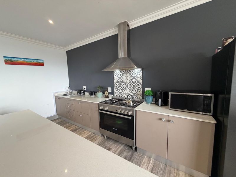 Modern Single-Level Cladded Brick Home with Ocean views - Photo 6