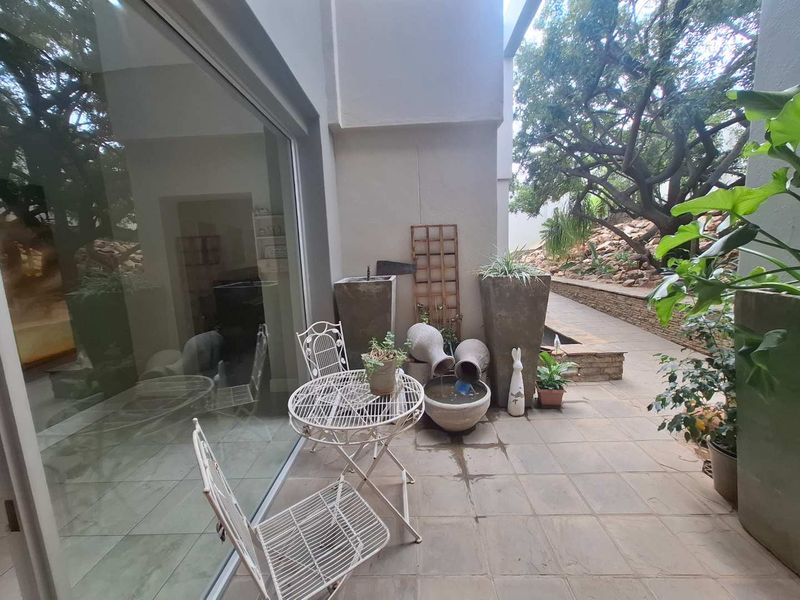 Modern Family Home in a Garden Oasis - Photo 9