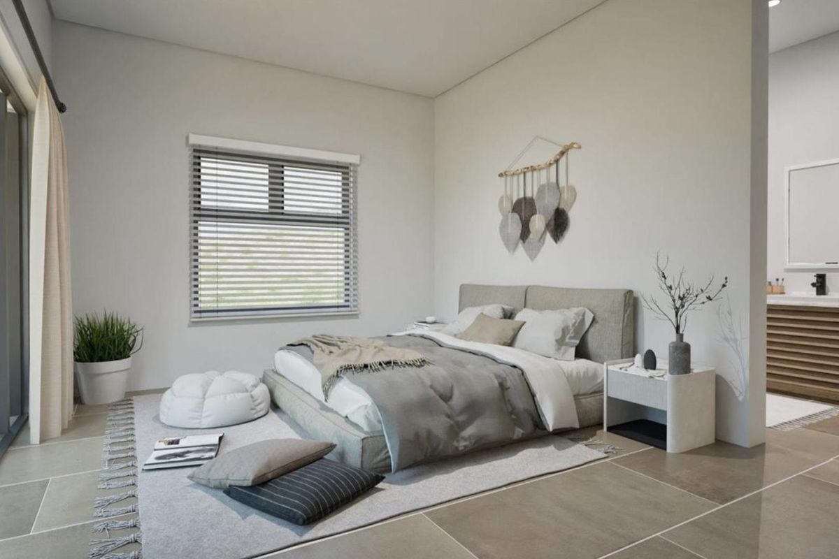 Modern bedroom featuring neutral tones, large format floor tiles, and an integrated en-suite bathroom area with a wooden vanity.