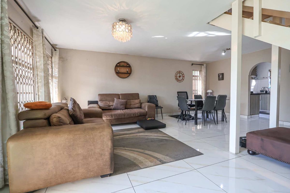 Stylish 3-Bedroom Duplex- Entertain In Style with Private Garden and Built In Braai - Photo 5