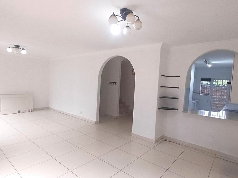 Spacious, Affordable Double-Storey Living with Patio & Pool - Photo 6