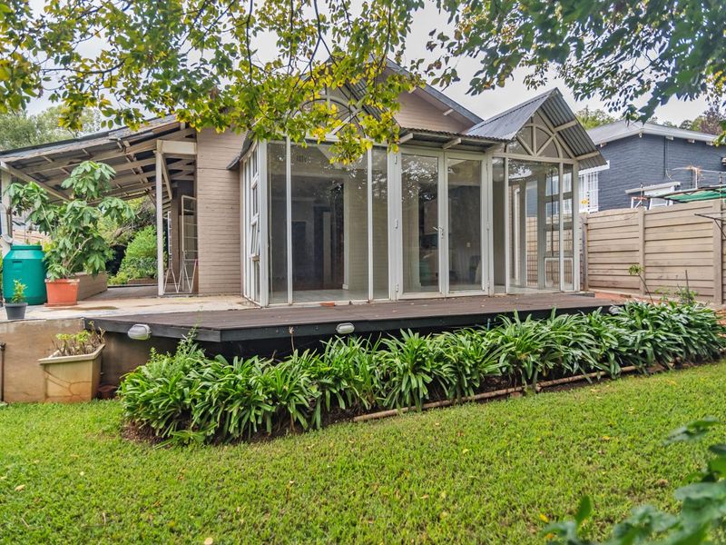 Beautifully Landscaped Garden with Covered Patio Retreat - Photo 7