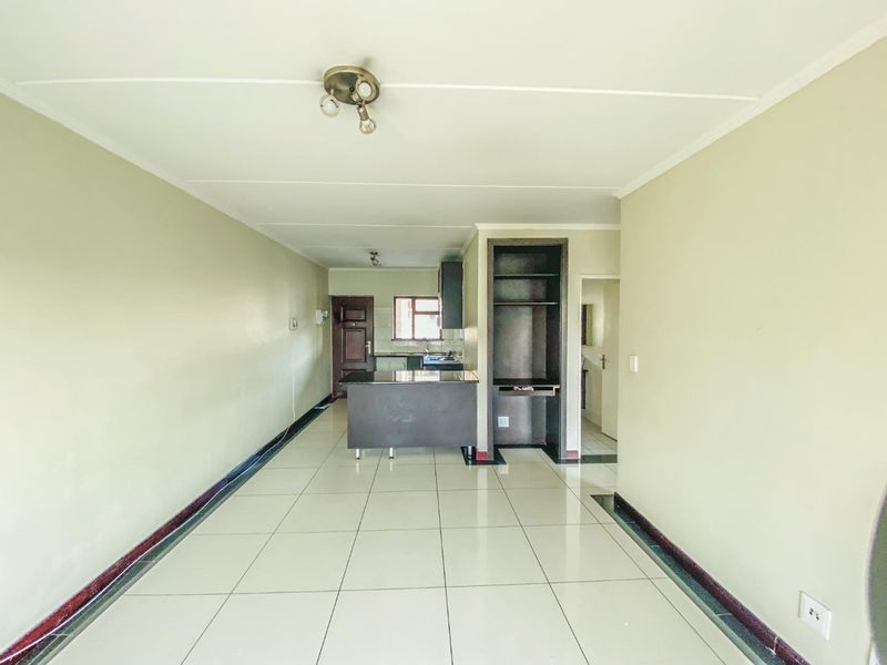Spacious 2-Bedroom Home with Covered Parking in Secure Estate - Photo 7