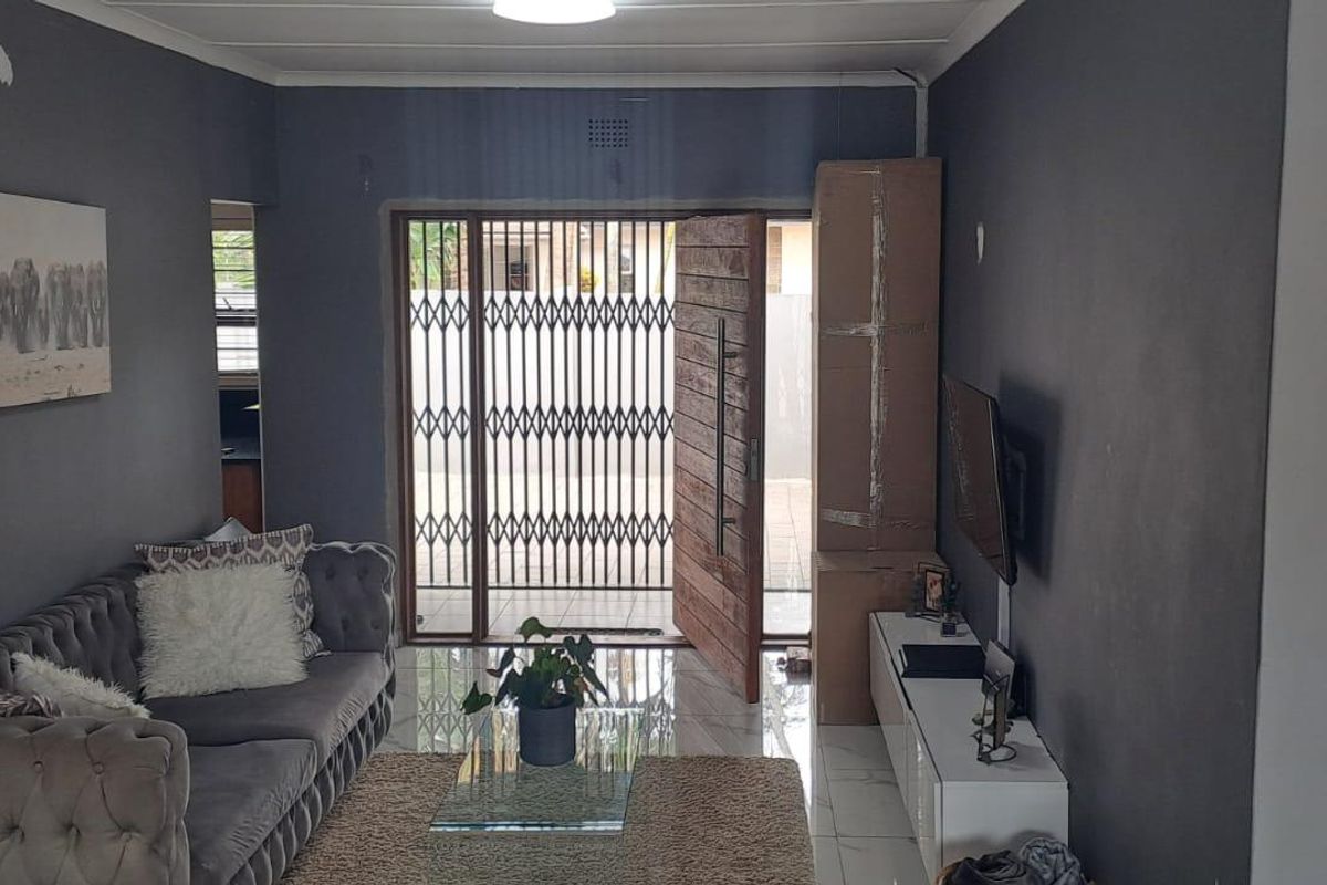 Step into this spacious and well-appointed 4-bedroom home, designed for comfortable family living and effortless entertaining. - Photo 3