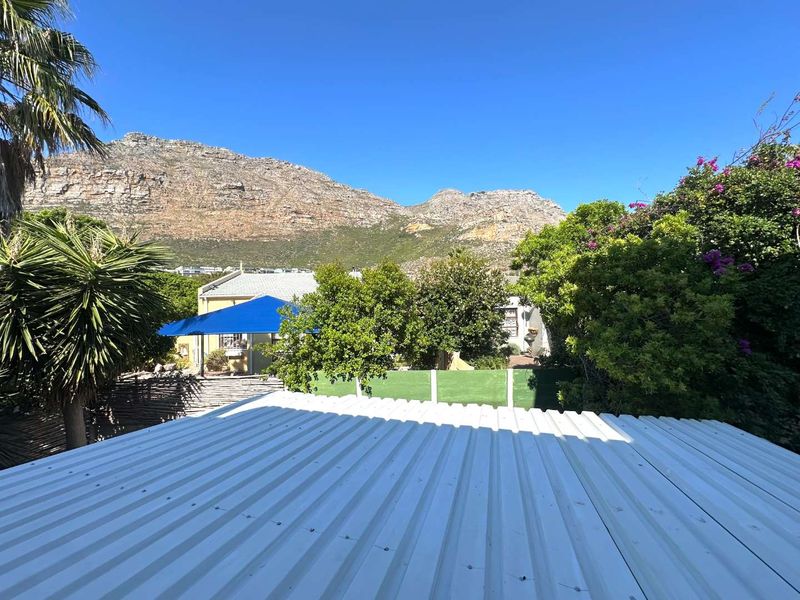 Mountain views, generous space, and income from day one. - Photo 5