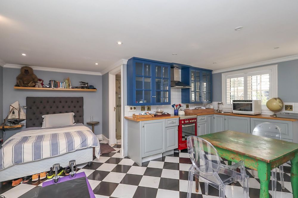 Flatlet bedroom bathroom kitchen with own entrance and can open or close off to the tv room, and also to the rest of the house bottom floor
