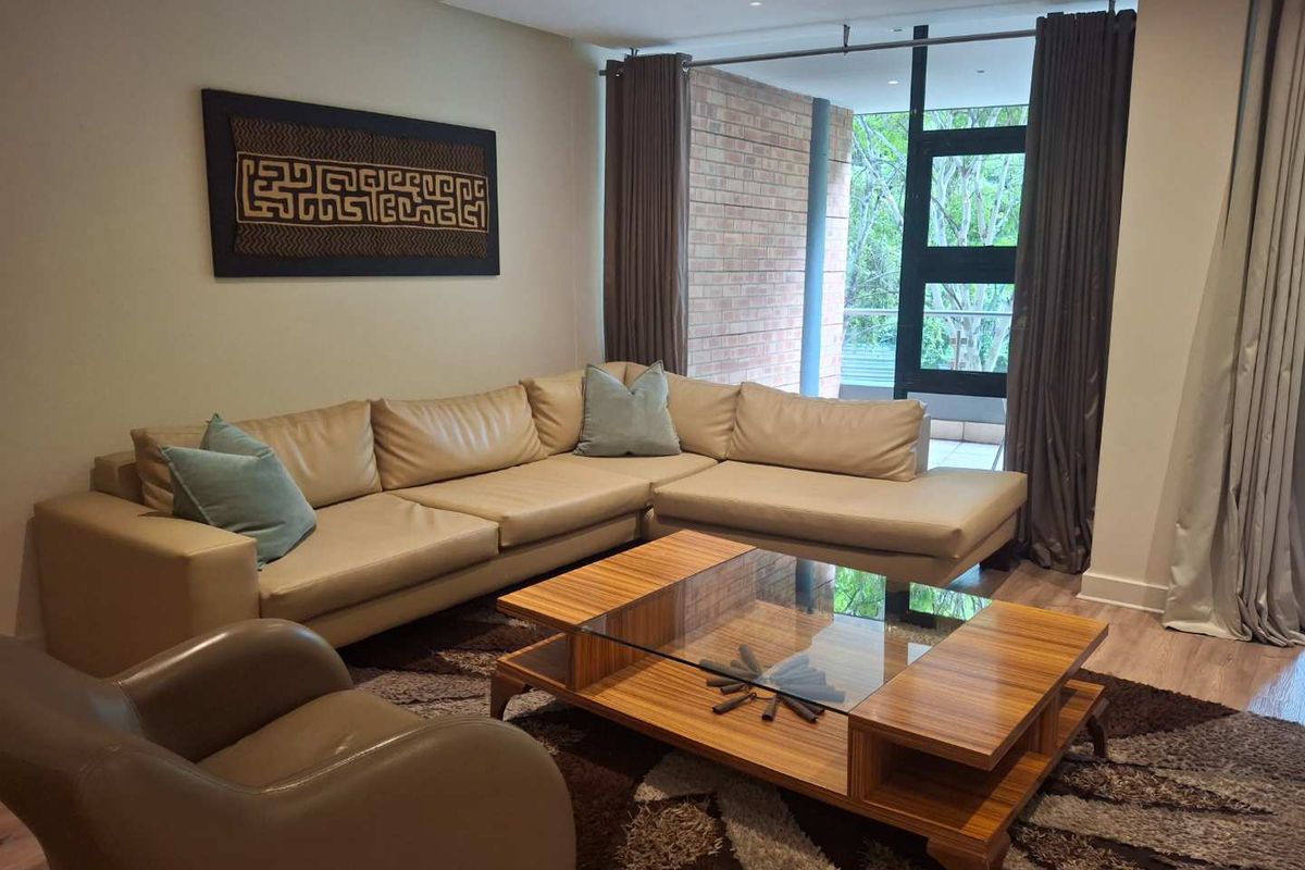 A TASTEFULLY FURNISHED TWO BEDROOM APARTMENT - Photo 2