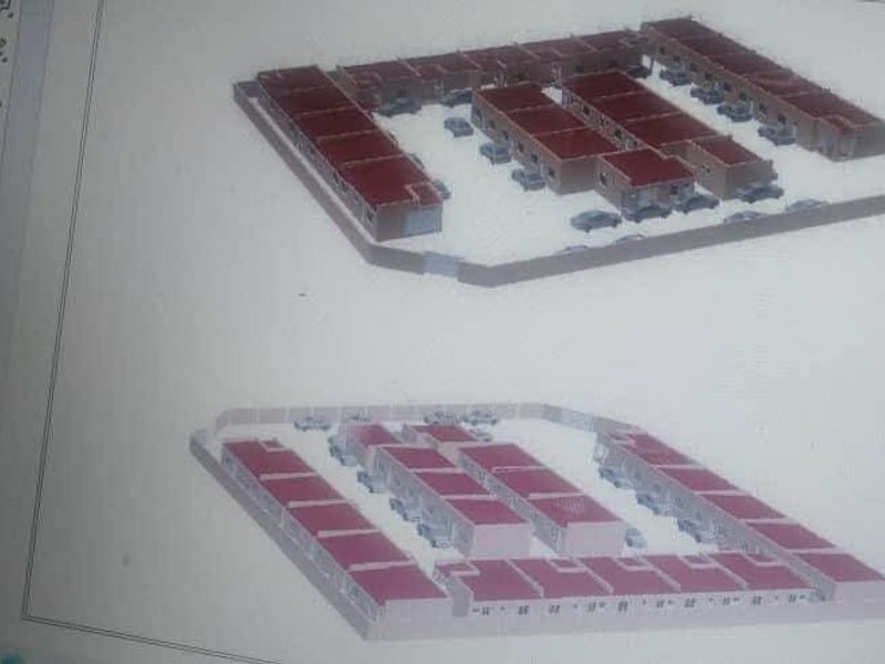 A digital architectural site plan showing the layout of a residential complex with multiple units and parking areas.