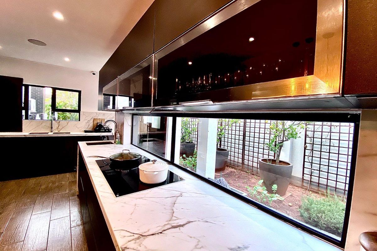 Luxury 5-Bedroom Home with Smart Automation & Triple Garage - Photo 3