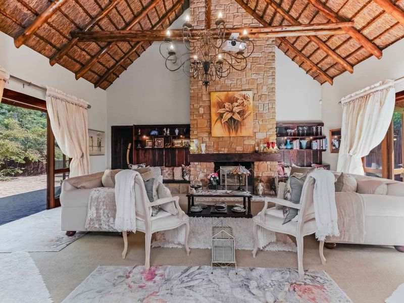 AN EXQUISITE, BUSH LODGE-THEMED, FAMILY SANCTUARY OFFERING TIMELESS ELEGANCE AND UNMATCHED TRANQUILITY IN A SERENE INDIGENOUS GARDEN SETTING - Photo 3