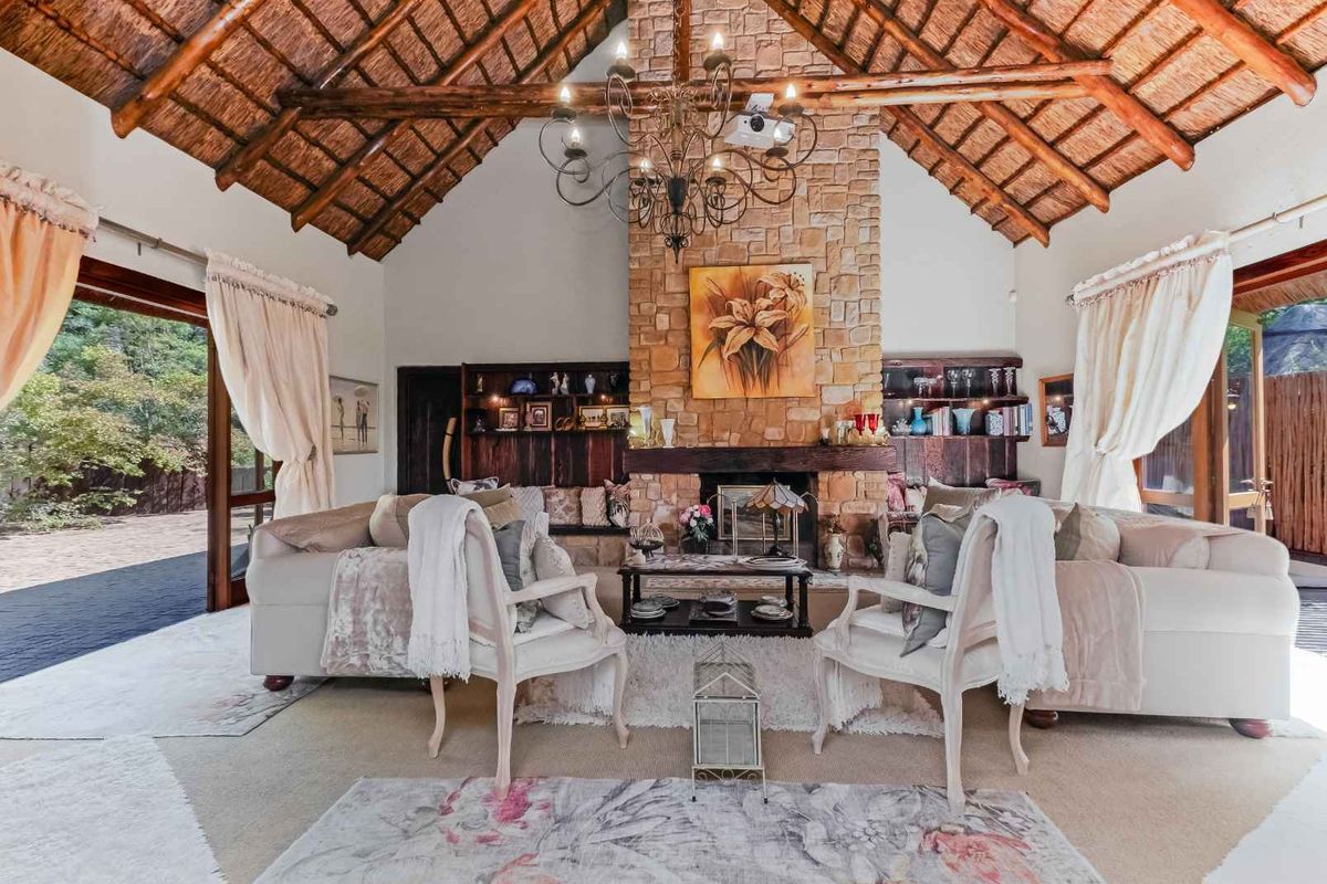 AN EXQUISITE, BUSH LODGE-THEMED, FAMILY SANCTUARY OFFERING TIMELESS ELEGANCE AND UNMATCHED TRANQUILITY IN A SERENE INDIGENOUS GARDEN SETTING - Photo 3
